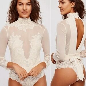 NWT“HAH WE ARE” Reversible Body Suit!